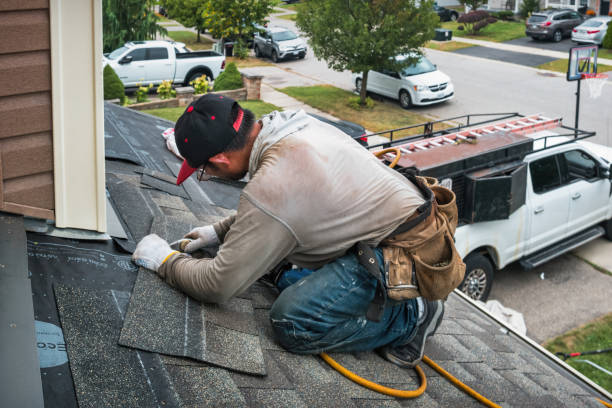 Professional Gutter Repair And Installation technician working in Lookeba, OK